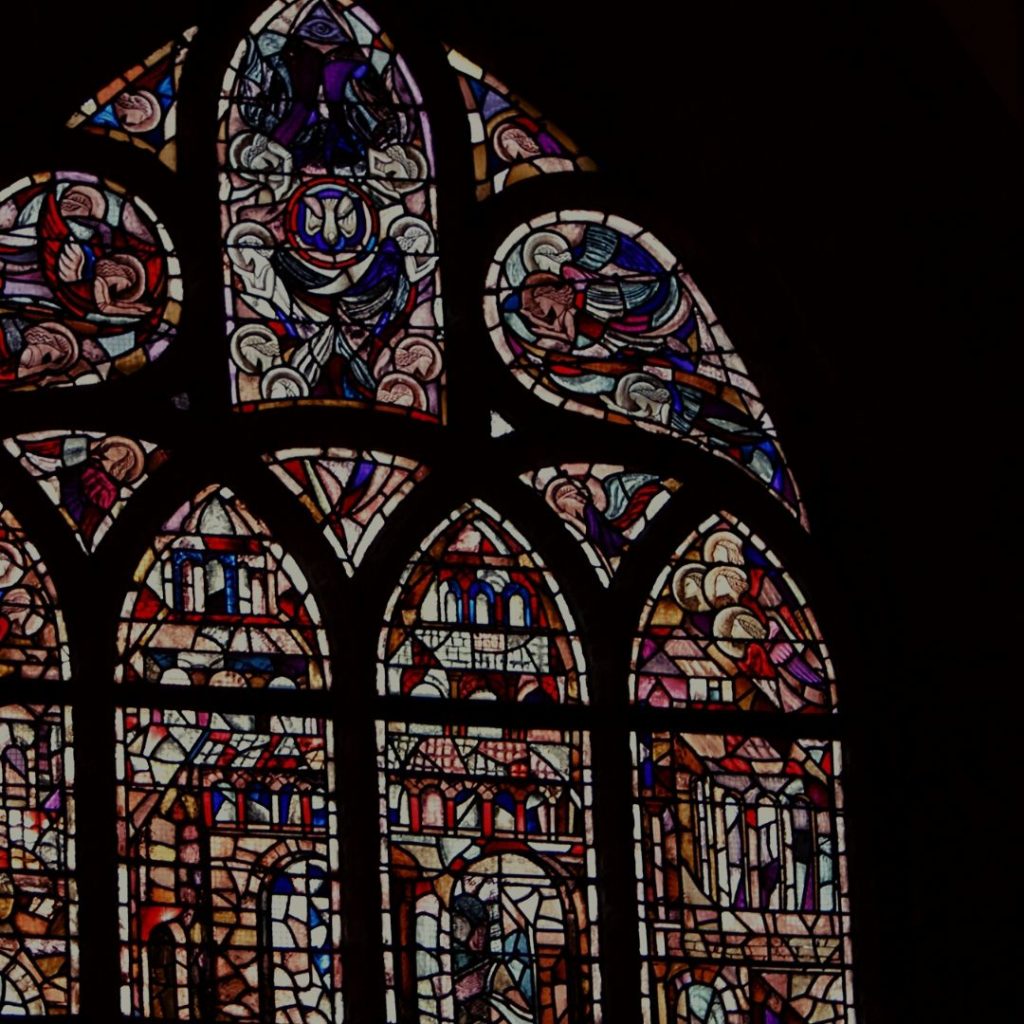 Stained glass window against black background